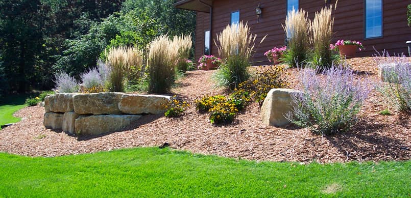 Ornamental grass and perennial mulch beds